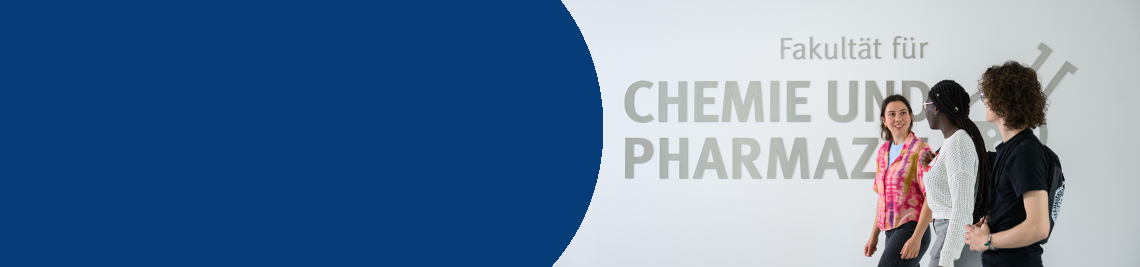 Your interests, your studies Students in front of the faculty logo in the internship building